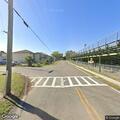 Traffic stop on black Nissan sedan near Kings Avenue
