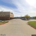 Person slumped over in car on Pacific St in Denton
