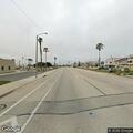 Dirt bike and car doing donuts in Oxnard