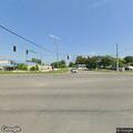 Piece of drywall creating road hazard on Broadway
