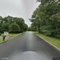Shirtless man reported walking back and forth on road