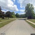 Car parked in front of hydrant on wrong side of road