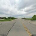 Pickup truck hits deer at highway intersection