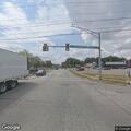 Disabled vehicle causing traffic hazard in roadway