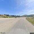 Person on shoulder causing traffic hazard