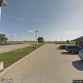 Traffic stop on black Ford blocking travel lane
