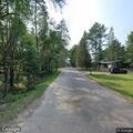 78-year-old man with breathing difficulty in driveway