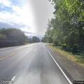 Person lying in roadway at North Bend intersection