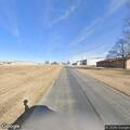 Officer handling injured animal near Old Highway 60