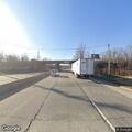 Person having a seizure in black car on Elmhurst highway