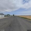 Brush pile fire along roadway near Moses Lake