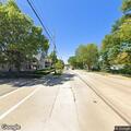 Erratic brown SUV reported on High Street