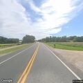 Debris from gray truck cracks car windshield on US 53