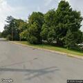 Snapped low wire blocking road on McAlpine Street