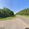 Vehicle in ditch after avoiding deer near Airport Road