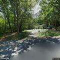Loose dog reported near armory on Honey Spring Street