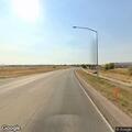 Traffic stop on dark blue Dodge Caravan