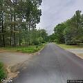 Suspicious dark sedan reported on Chase Brook Circle