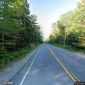 Safety concern with car near utility pole on Route 26