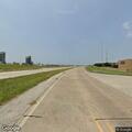 Road work narrows frontage road and blocks traffic