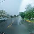 Vehicle fluid spill causing road hazard on Main Street