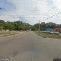 Officer conducts traffic stop on silver sedan