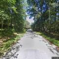 Tree on wires blocking roadway on Chittenden Lane