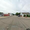 Car with trailer parked by stop sign nearly causes crash