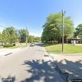 Complaint about cars parked in yard on King Street