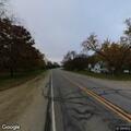 Reckless driving with person hanging from vehicle