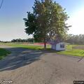 Traffic stop on black sedan and white truck