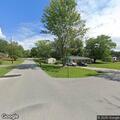 Vehicle hits mailbox; driver has head injury
