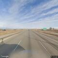 Vehicle blocking I-25 off-ramp at Erie Parkway