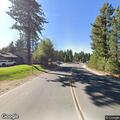 Silver sedan driving without lights reported