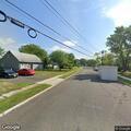 Person experiencing severe headache on Franciscan Way