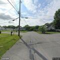 Person welfare checked near school bus at intersection
