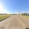 Person slumped over wheel in car at Shreveport intersection