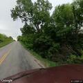 Older man walking oddly on highway near Rayville, MO