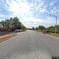 Woman found unconscious but breathing in running car