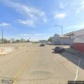 Railroad crossing arms stuck down at intersection