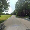 Traffic stop on black Chrysler minivan