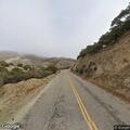 Driver with flat tire needs help on Nacimiento Lake Dr