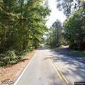 Person experiencing back pain near Lithia Springs