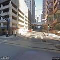 Person fallen at Main and East 18th Street
