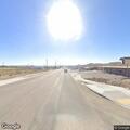 Person with breathing problem at intersection in Dolan Springs