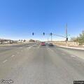 Driver reported running red light and swerving