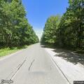 Abandoned car blocking lane on Washington Mountain Road