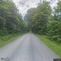 Motorcycle and rider left after crash with deer