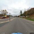 Single-vehicle crash with car on its side