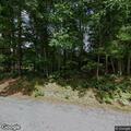 Tree limb on power lines causing arcing